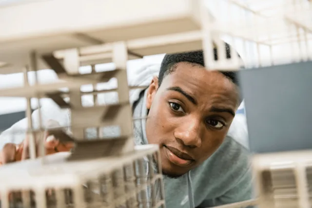 A student looking at a project in the Architecture building