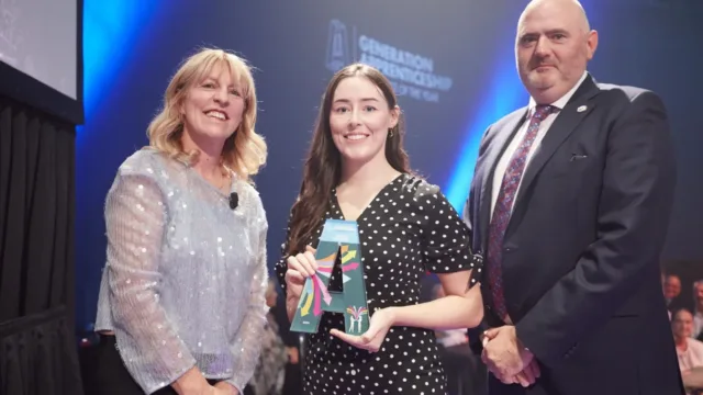 Image of ATU engineering student collecting award for apprentice of the year