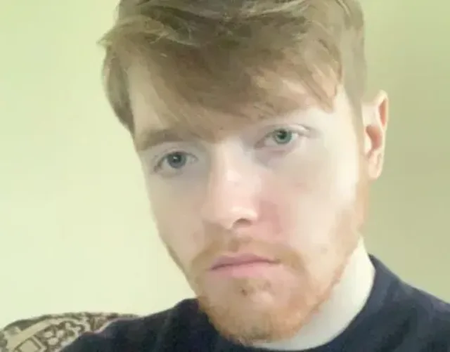 ATU student Ryan- Man with beard in black top