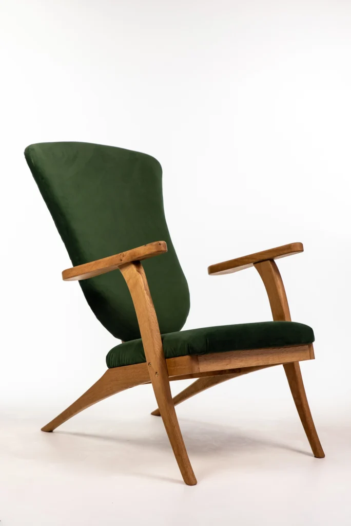 An oak and green velvet chair