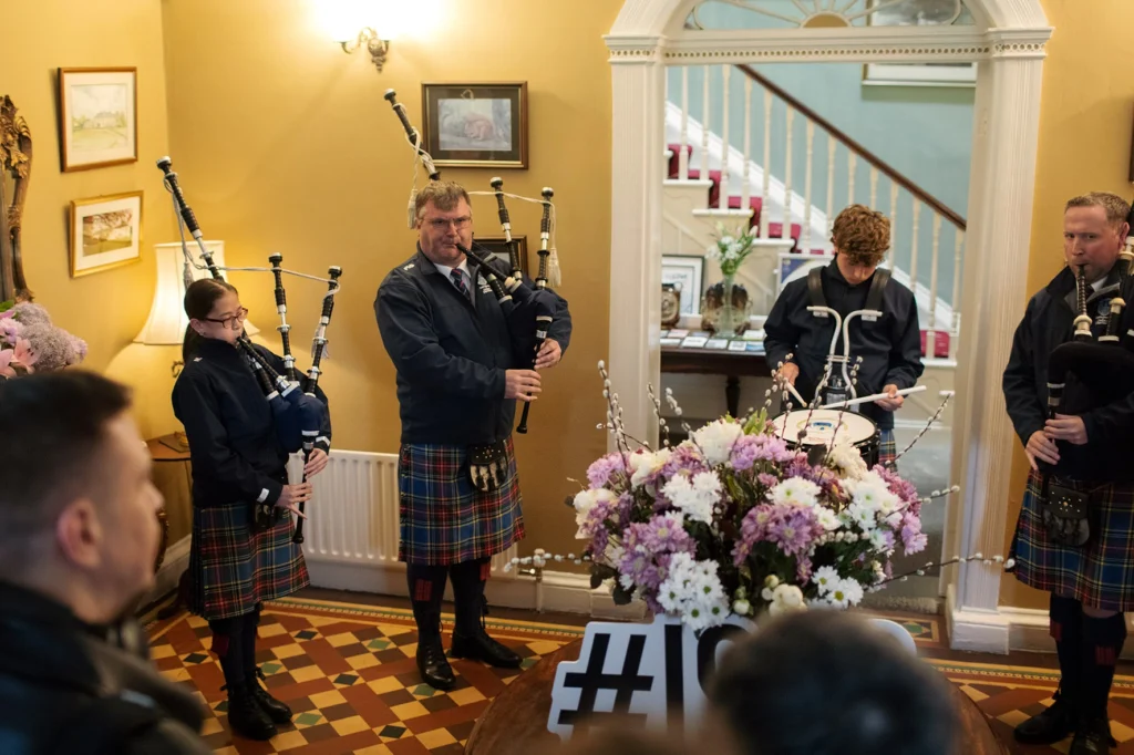 The Letterkenny & District Pipe Band performing to the attendees.
