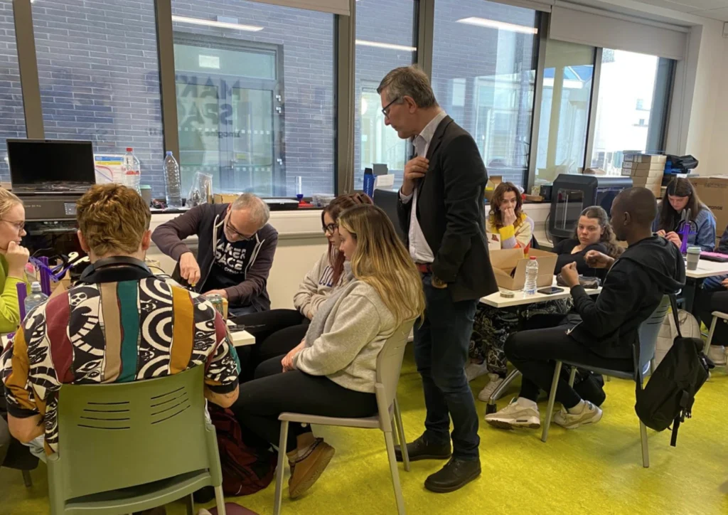 Social Care Practice students sitting at tables in the ATU MakerSpace