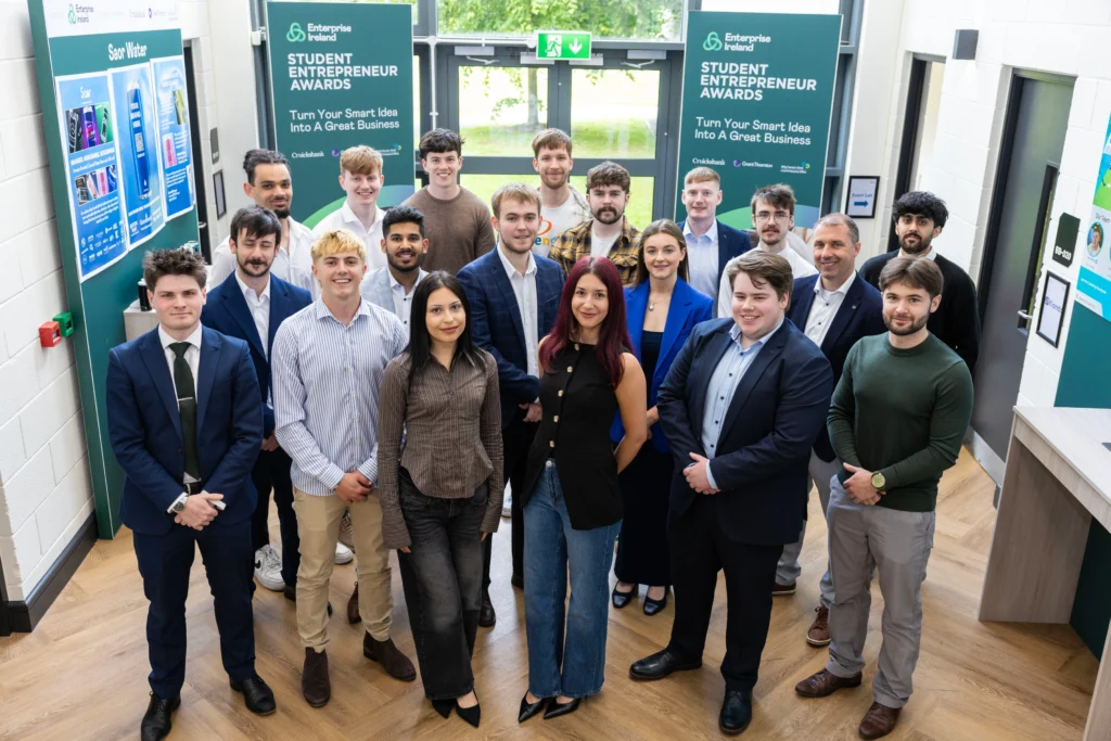 Groupshot of students at the Student Entrepreneur Awards, standing smiling at the camera