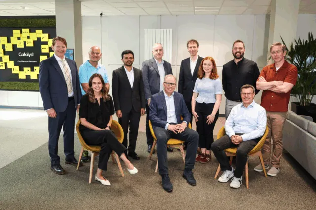 Group shot featuring academic leads and university representatives from the OneHealth consortium.