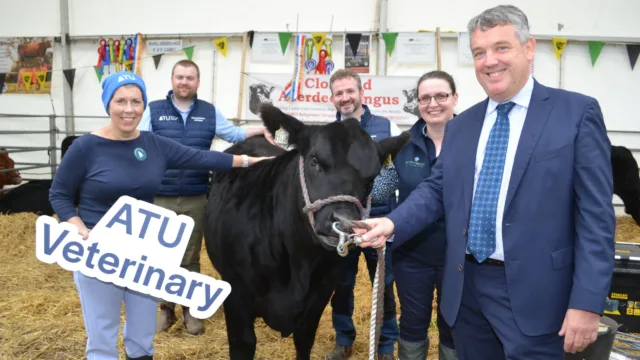 Dr Orla Flynn, ATU President, Dr John Donlon ATU Veterinary Lecturer, Prof Patrick Pollock, new Head of Veterinary Medicine and Surgery at ATU, Dr Edna Curley, Head of Mountbellew Agricultural College, ATU and Dr Billy Bennett Registrar and Chief Academic Officer at ATU with "Mandy" the cow.