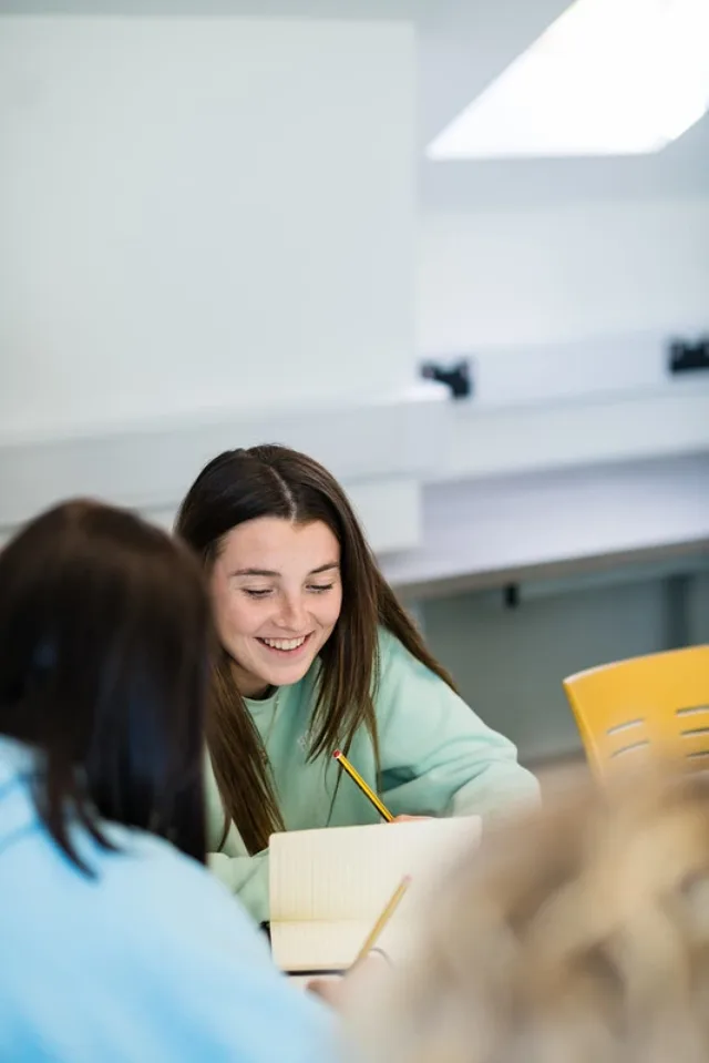 image of two students studying