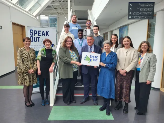 ATU staff and students with Speak Out sign