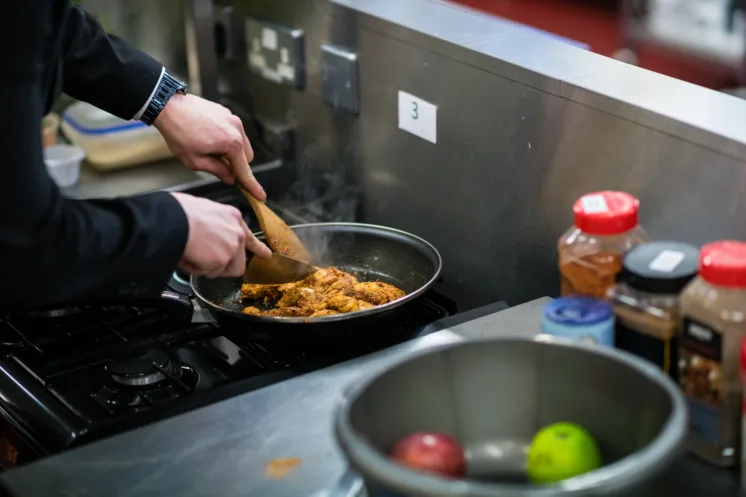 Generic photo of chicken being cooked on a pan