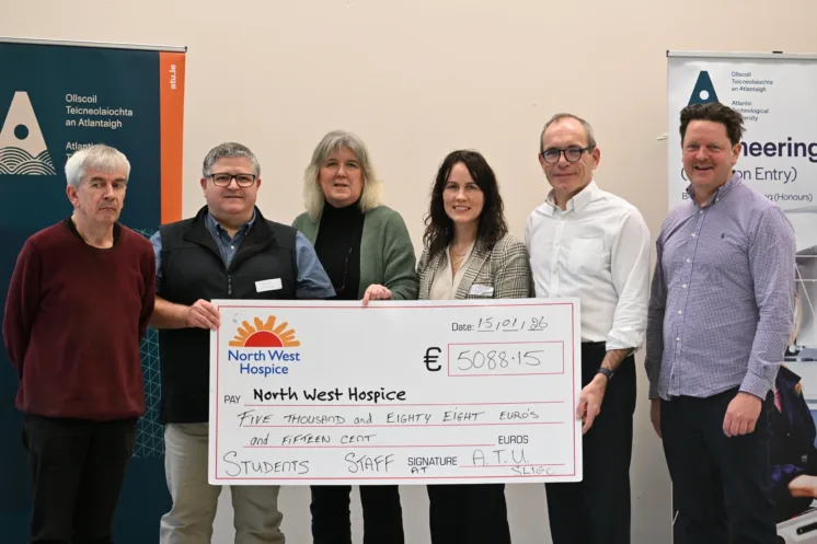 Mary Forte of North West Hospice Charity receiving another cheque from ATU.  Over the past year, ATU has raised over 15,000 euro by collecting over 100,000 cans and bottles on campus.