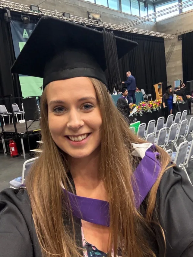 Female at Graduation in a cap and gown