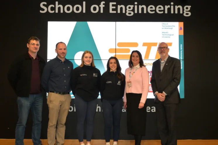 Dr Oliver Mulryan, ATU lecturer, David Keary, lecturer, mentor and competition co-ordinator, students Caoimhe DeBrún from Kilnamona, Co Clare and Veronica Creaven from Loughrea, Co Galway, 4th year Mechanical Engineering and ATU Internal Combustion Team representatives, who will take part in the 2026 Formula Student UK concept class competition in Silverstone in July, Ailish Conway, TE Connectivity (sponsor), and Eamon Walsh, Head of Dept of Mechanical and Industrial Engineering, ATU Galway city.