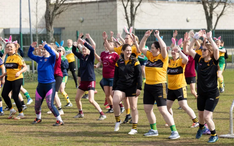 Women take part in the Gaelic for Mothers & Others football blitz at Fit Féile, ATU, promoting health, wellbeing and community
