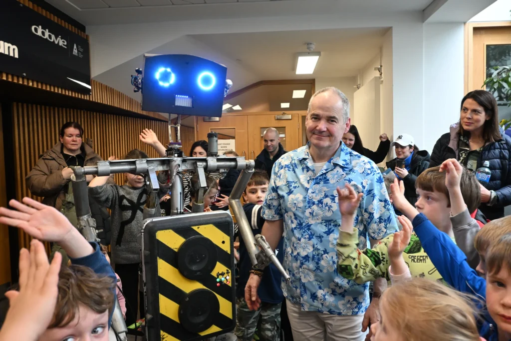 Zulu from Mechatrons with Alex the robot at the ATU Engineering Fair.