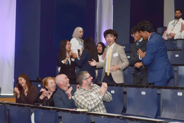 Team HexCrate from Texas A&M University reacts as their name is announced as the winning team.