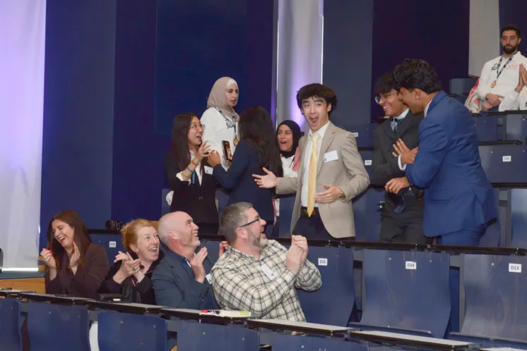 Team HexCrate from Texas A&M University reacts as their name is announced as the winning team.
