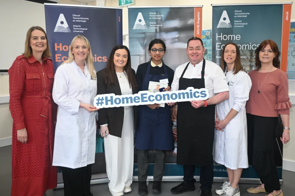 Dr Elaine Mooney, Director of National Centre of Excellence for Home Economics, ATU St Angelas, Dr Amanda McCloat, Head of Department of Education Sciences & Head of St Angela's Campus, Parent, Teacher, Angel Lijoy John, Junior Silver winner 2026, Scoil Mhuire Strokestown, Lisroyne, Strokestown, Roscommon, Chef Neven Maguire, Dr Helen Maguire, Head of Department of Home Economics, ATU St Angelas, and Dr Eileen Kelly Blakeney, Lecturer Department of Home Economics, ATU St Angelas.