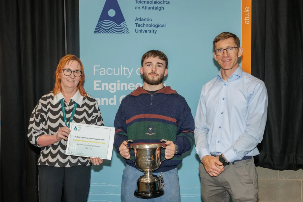 Paul Carty (in the middle), pictured with the Engineers Ireland NW representative and Dr Trevor McSharry, Head of School of Built Environment at ATU, was awarded the Engineers Ireland North West Perpetual Cup for his automated filtration system for organic solvents using magnetic nanoparticles.