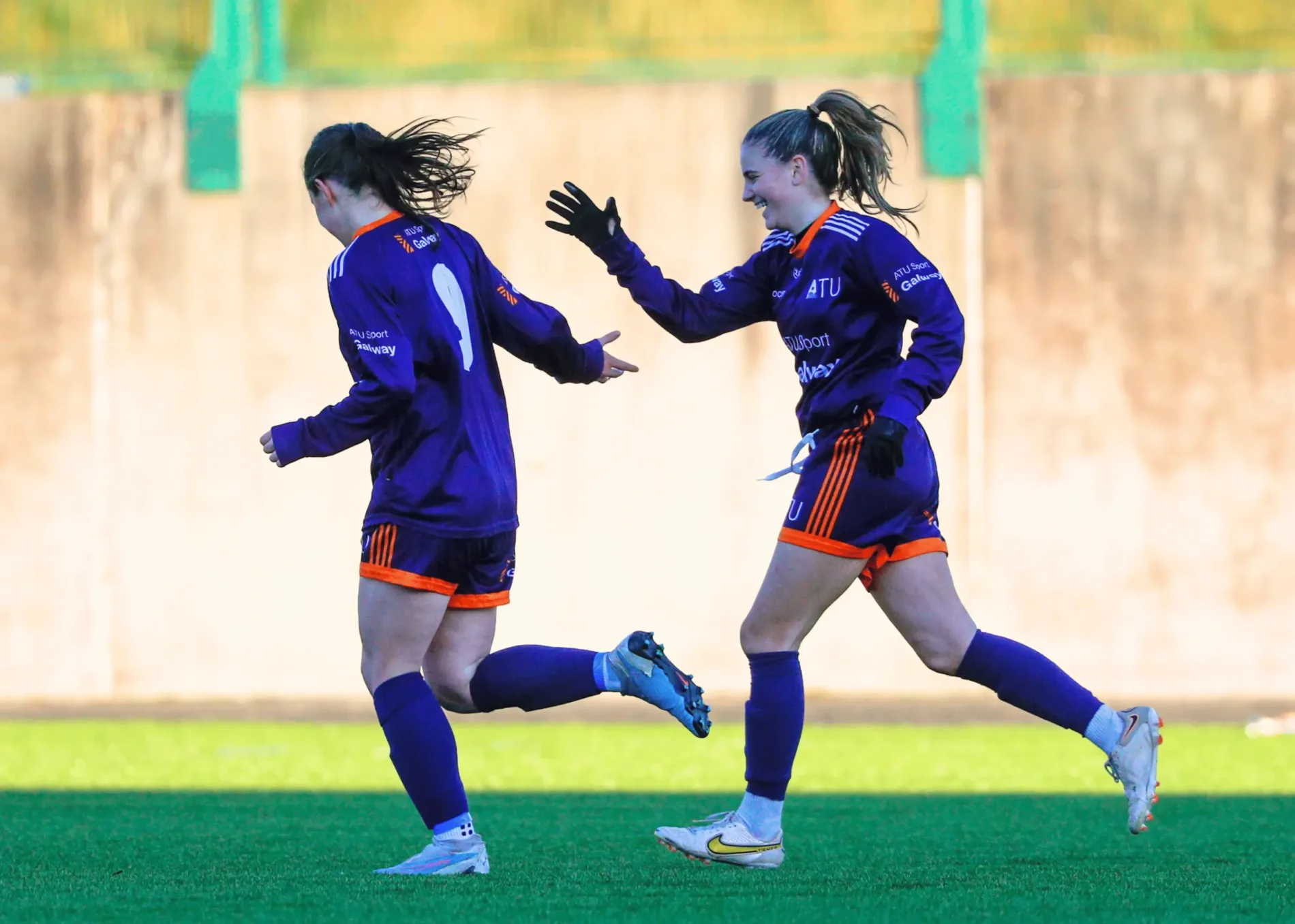 Girl playing football