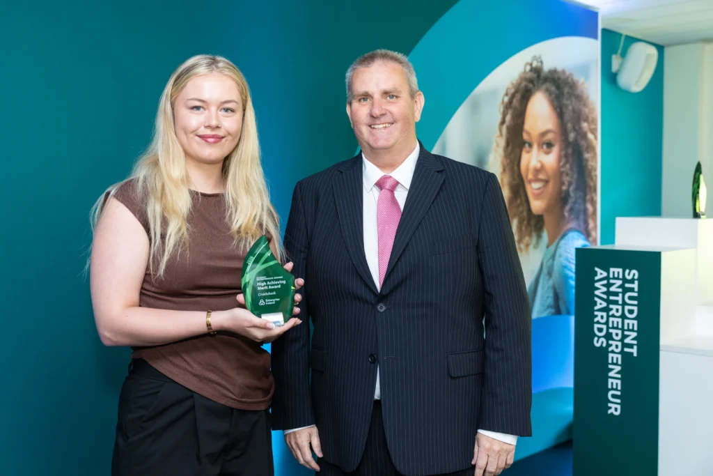 ATU Galway first year Business student Sienna Joyce Faherty presented with the prestigious Cruickshank High Achieving Merit Award and €5,000 for her business The Hill Café, from Richard Cruickshank.