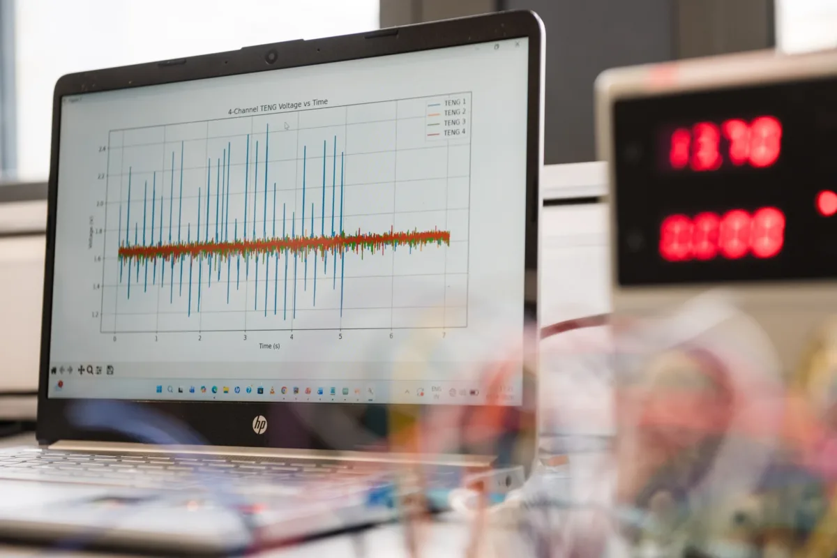computer with graph showing frequency levels