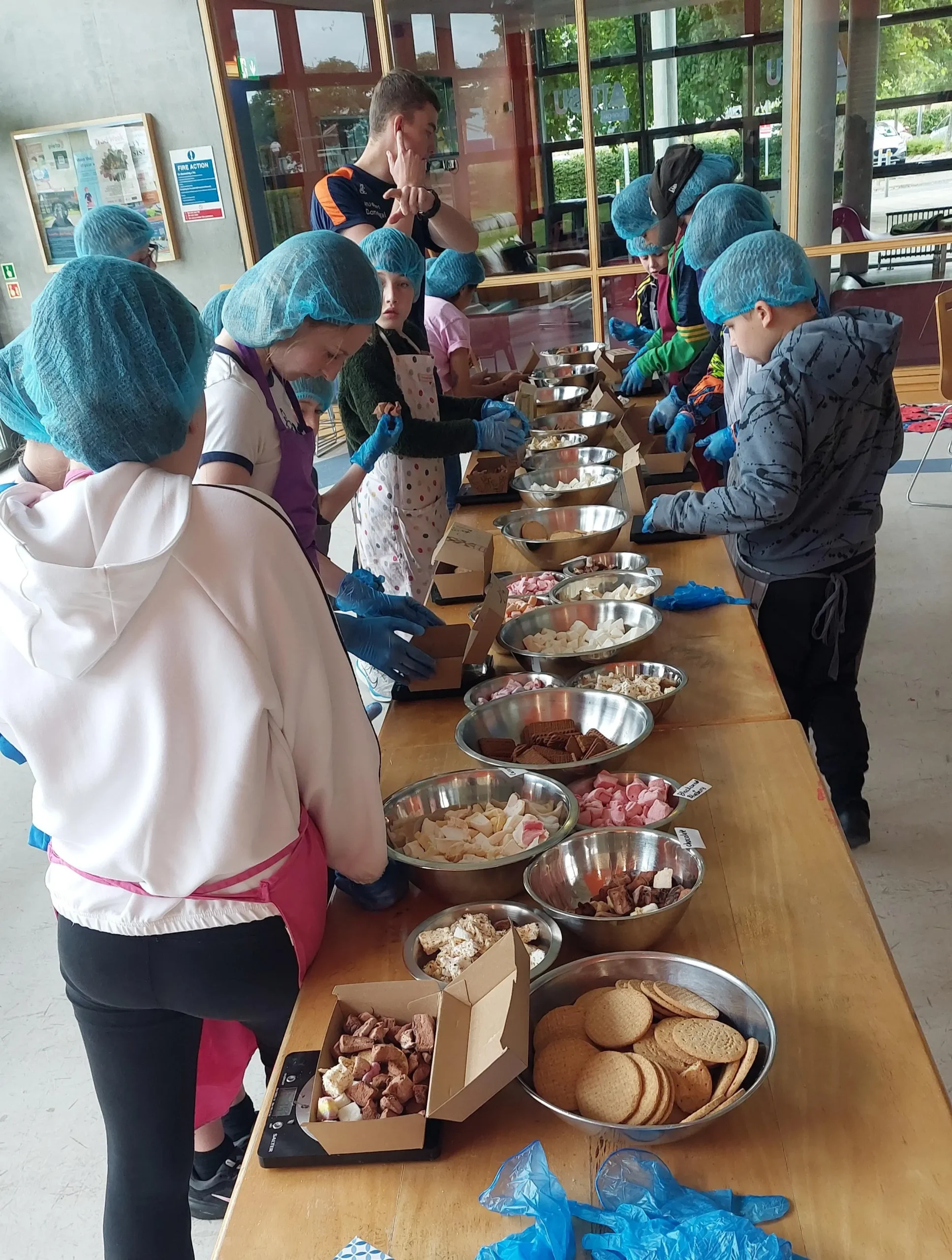 Children at table baking