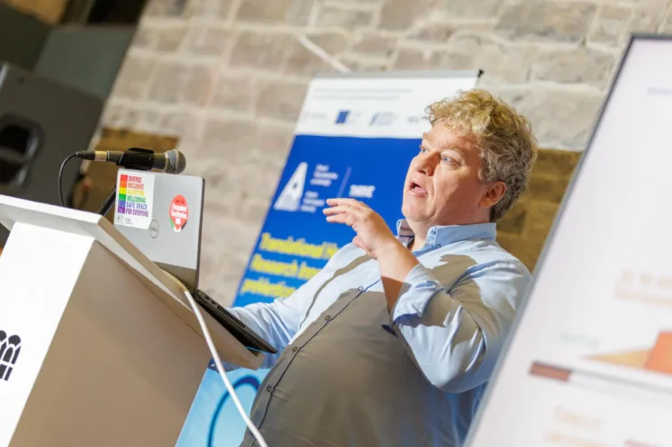 Dr Jamie Roche delivering presentation